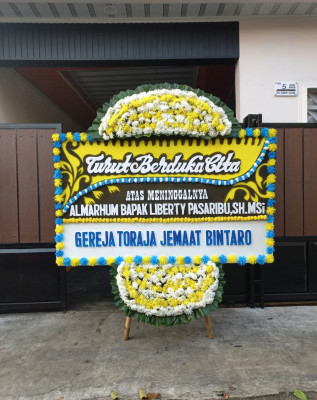 Papan Bunga Duka di Kampung Bandar